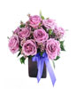 12 Purple Roses in a vase