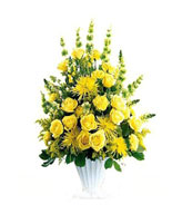 classic funeral arrangement in yellow 