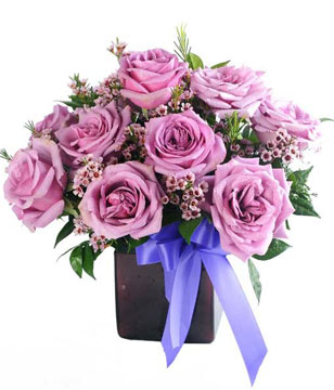 12 Purple Roses in a vase