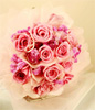 12 Pink Roses With Fillers Hand Bouquet