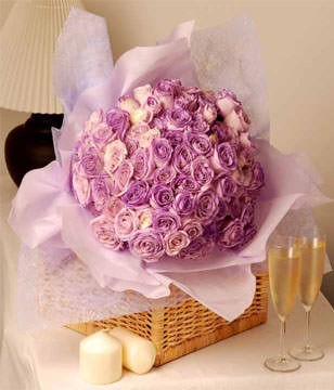 99 stalks purple and white roses hand bouquet