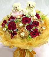 10 Red roses,chocolate flowers,A pair of bear