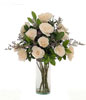 12 white roses in a glass vase