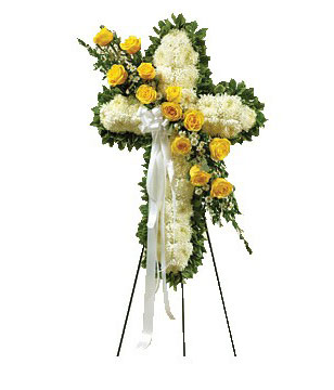 This standing spray arrangement - in the shape of a cross - is created from fresh yellow and white flowers such as roses, football mums and more.