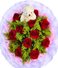 11 red roses, a Bear