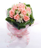 18 Pink roses with greenery with pink paper wrapping