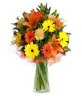 Lilies, solidago, carnations, and gerberas.