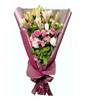 Pink stargazer lilies with pink roses in a bouquet
