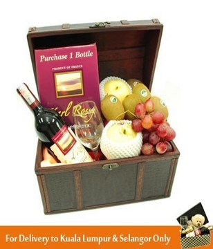Red Wine, Wine Glass with Assorted Fruits in a Treasure Chest