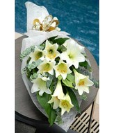 Long sheath white lilies hand bouquet