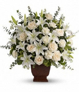 Arrangement of creme roses, white oriental lilies, carnations, eucalyptus and more 