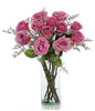 12 Purple roses in a glass vase 