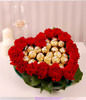 red carnations and Ferrero Rocher Chocolates in Heart Shaped Tray