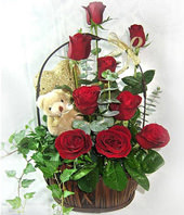 9 Red roses and A bear