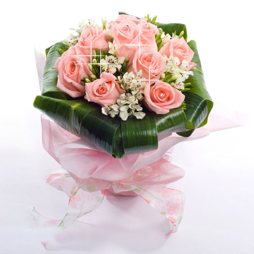 18 Pink roses with greenery with pink paper wrapping