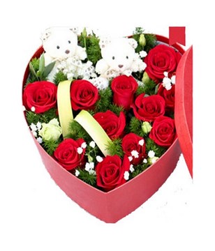 12 red roses with babybreath, and 2 cute bears arranged in a heart shape