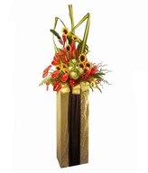 Sunflowers, anthuriums, cabbage, ginger and ann black on a golden box stand