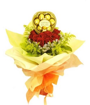 Chocolates with roses and foliage