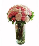Peach and pink roses in a bouquet